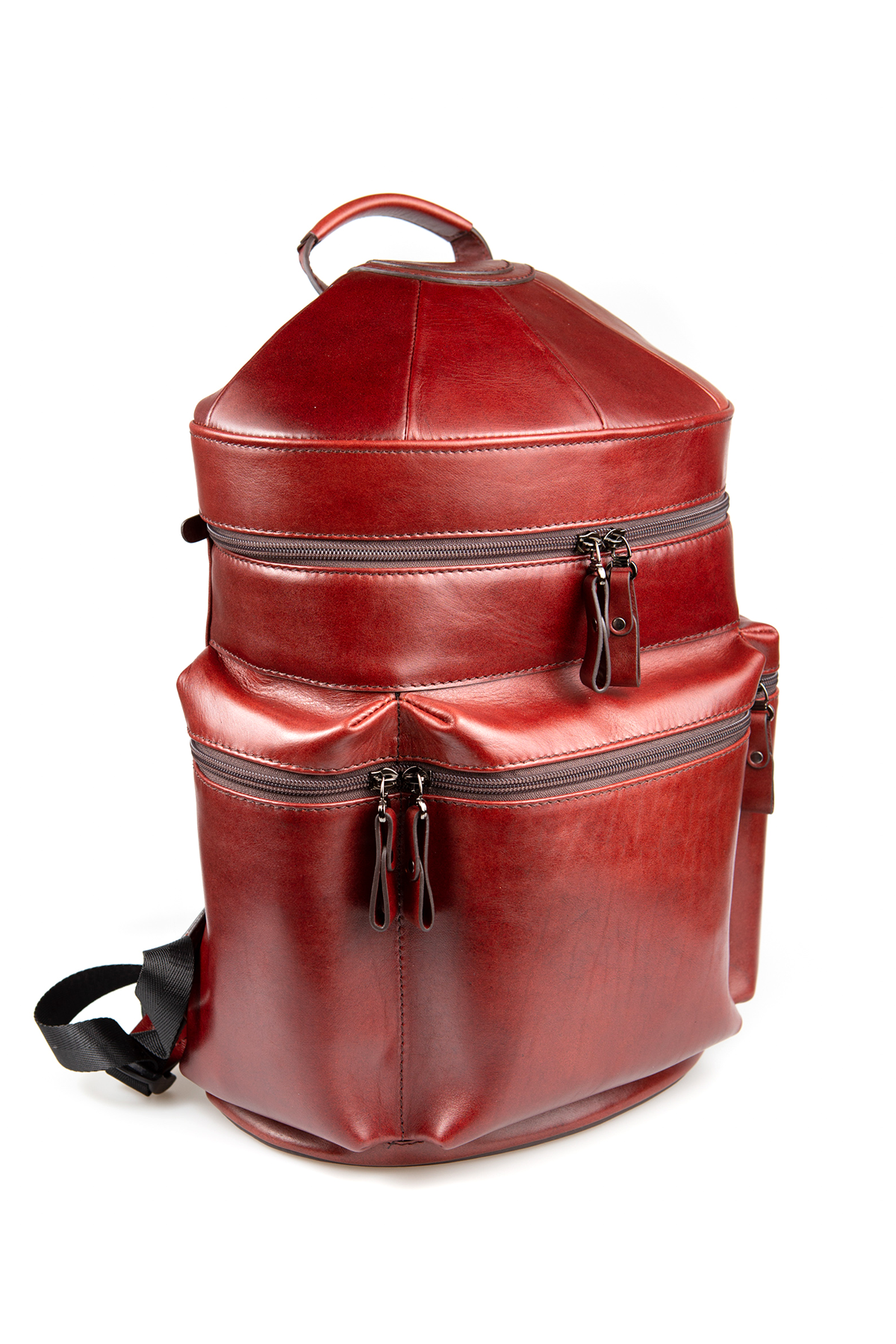 A genuine leather backpack with a yurt design