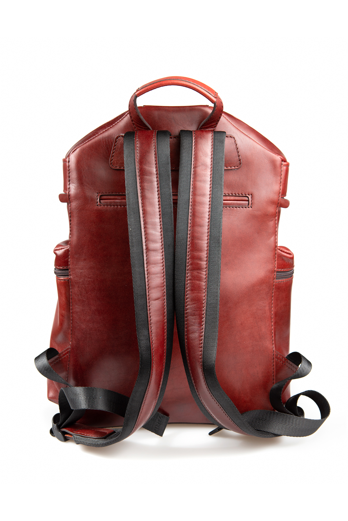 A genuine leather backpack as seen from a rear-facing view